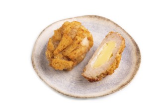 Chicken schnitzel on blue plate isolated on white background. side view, copy space