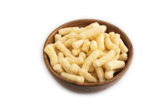 Corn flakes sticks with caramel in wooden bowl isolated on white background. side view, close up
