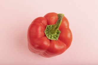 Red pepper on pink pastel background. Top view, flat lay, copy space. healthy food, vegetable,