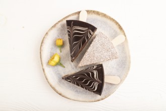 Chocolate and Vanilla Cake pops Marshmallow on white wooden background. top view, flat lay, copy