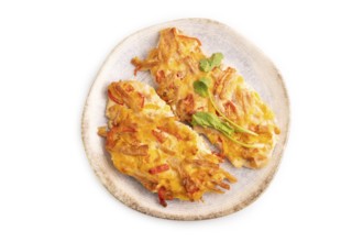 Baked chicken meat with cheese and tomatoes isolated on white background. top view, flat lay, close