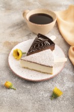 Chocolate and Vanilla Cake pops Marshmallow with cup of coffee on brown concrete background and