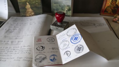 Stamp in a pilgrim's passport on a guest book, pilgrimage route Olavsweg or Olavsleden,