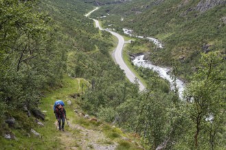 Pilgrims on the Kongevegen or King's Road, Olavsleden pilgrimage route, Drivdalen valley, ascent to