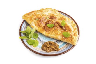 Fried homemade Khachapuri cake with cheese and meat, fried in pan. Traditional Georgian cuisine