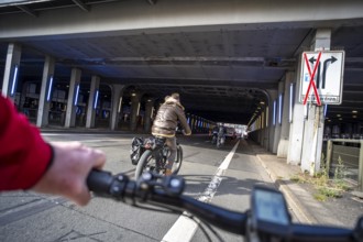 Riding a bike on a bike lane, at Essen main station, tunnel in the city centre of Essen, North