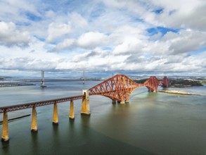 Forth Bridge from a drone, Queensferry Crossing, Forth Estuary, Scotland, United Kingdom