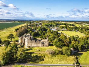 Ruins of Dirleton Castle & Gardens from a drone, Dirleton, East Lothian, Scotland, UK
