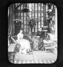 A magic lantern slide of Queen Mary, when Princess May of Teck, with her mother, the Duchess of