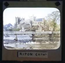 Colorised magic lantern slide of Ripon cathedral church from River Ure, Ripon, North Yorkshire,