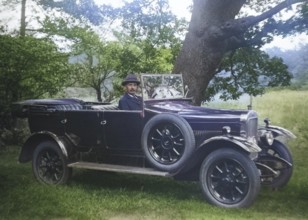 Vintage Sunbeam motor car with driver at wheel in rural setting, England, UK 1920s or 1930s