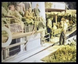 People sitting aboard River Thames steam packet ferry boat either SL Streatley of SS Nuneham,