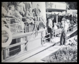 People sitting aboard River Thames steam packet ferry boat either SL Streatley or SS Nuneham,