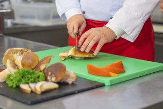 Preparing mushrooms on a chopping board in the kitchen