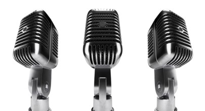Classic vintage microphone set with black inside mesh isolated on a white background