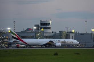 Emirates Boeing 777-300, after landing, at Düsseldorf Airport, North Rhine-Westphalia, Germany