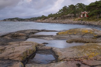 Falun red or Swedish red boathouses, Bohus granite, Resö island, Bohuslän, Skagerrak, Sotenäs,