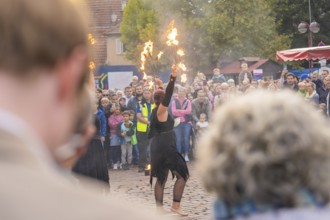 An artist thrills a large crowd with an impressive fire show, Feuernacht, Sindelfingen, Germany