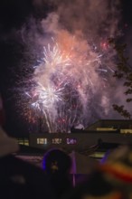 People watching fireworks in the night sky, Fire Night, Sindelfingen, Germany