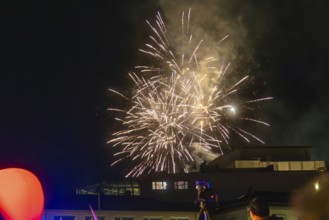 Fireworks illuminate the night sky above a building, atmospheric lights, Fire Night, Sindelfingen,