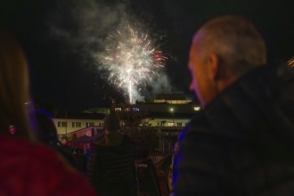 An impressive fireworks display lights up the night sky in front of planned spectators, Fire Night,
