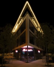 Night shot of a striking building in Hanover Herrenhausen, Hanover, Lower Saxony, Germany