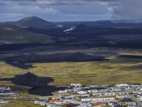 Lava, lava field, village, houses, summer, cloudy, sunny, aerial view, volcanic eruption, July