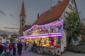 Shooting range in the evening at the parish fair in the village of Eschenau, Middle Franconia,