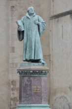 Luther monument, Martin Luther with Bible, sculpture, verdigris inscription, monument, Magdeburg,