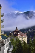 View over the village of Bad Gastein towards the snow-covered Ankogel group in the province of