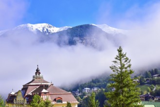 View over the village of Bad Gastein towards the snow-covered Ankogel group in the province of