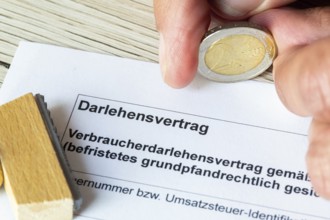 Close-up of a symbolic loan agreement