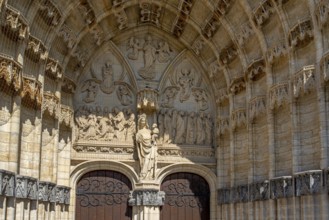 Portal of 14th century Onze-Lieve-Vrouw-ten-Poelkerk, Gothic church of Our Lady ten Poel in the