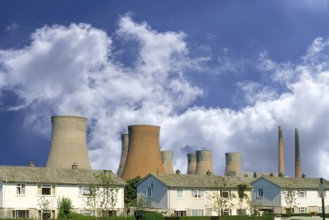 Cooling towers of a coal-fired power station next to a residential neighbourhood, Midlands,