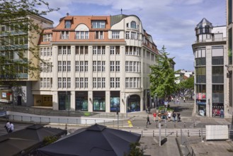 City centre, general architecture, shops, pedestrians as accessories, elevated perspective, blue