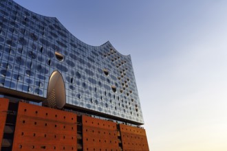 Facade of the Elbphilharmonie with Plaza viewing platform, blue sky, evening light, Hamburg,
