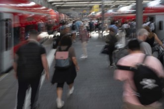 Travellers on the platform at Munich Central Station, Movement, Munich, Bavaria, Germany