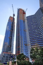 Construction cranes on the new construction of two skyscrapers, New York City, USA