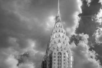 Spire of the Crysler Building, built in Art Deco style in 1928, black and white, New York City, USA