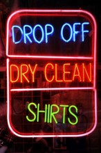 Illuminated advertising for a laundry, New York City, USA
