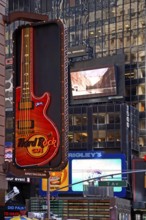 Illuminated advertising for the Hard Rock Café in Manhattan, New York City, USA