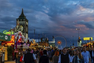Visitors on the evening festival meadow, Theresienwiese, Oktoberfest, Munich, Upper Bavaria,