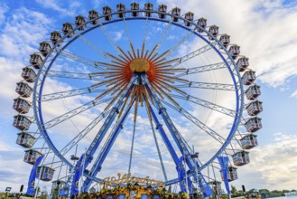 Ferris wheel in front of a white-blue sky, Festwiese, Theresienwiese, Oktoberfest, Munich, Upper