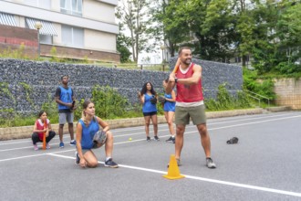 Baseball player gripping a bat, preparing to swing at an incoming pitch during an intense game,
