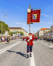 Flag bearer of the marching band of the Teisnach volunteer fire brigade in Lower Bavaria,