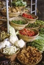 Market stall selling vegetables inside new market building, Johor Bahru, Jahor, Malaya, Malaysia,