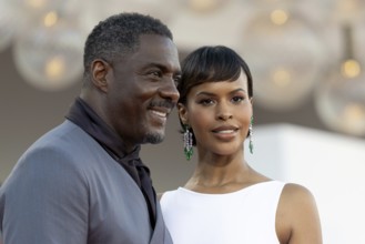 Venice, Italy - 2 September 2025: Idris Elba and Sabrina Dhowre Elba during the red carpet of - A