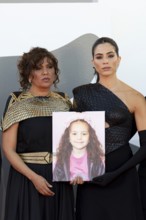 Venice, Italy - 3 September 2025: Kaouther Ben Hania and Saja Kilani with a portrait of