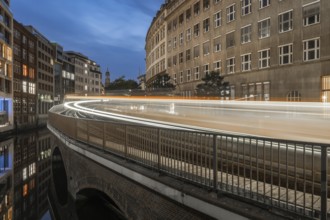 Long exposure at Mönkedamm with underground line U3 and light strip and St Michael's Church in the