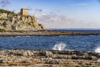 The Torre dell'Alto watchtower on the coast of the Porto Selvaggio nature reserve, Santa Caterina,